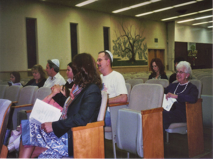 Members praying in Temple.